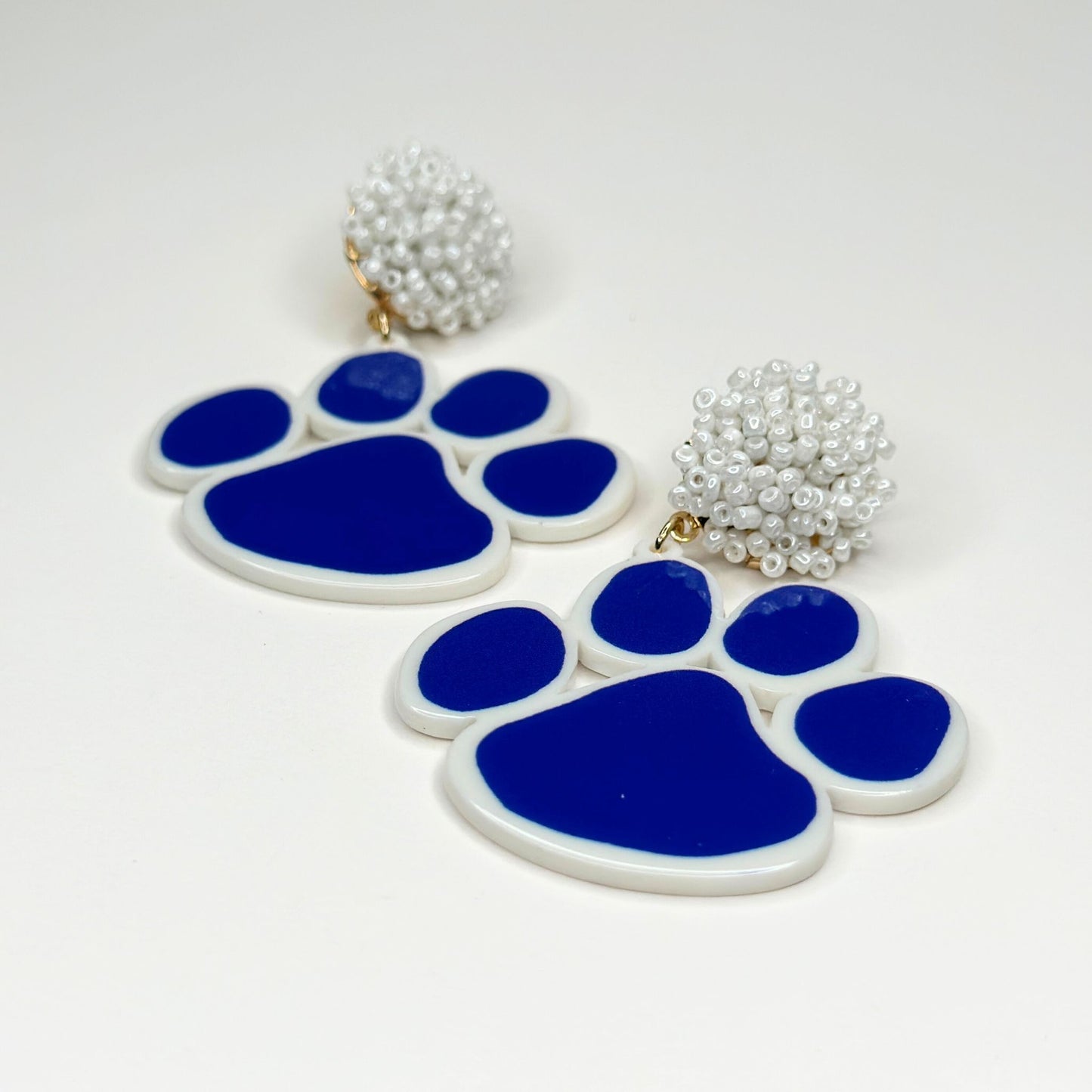 Acrylic Tiger Paw & Pompom Earrings